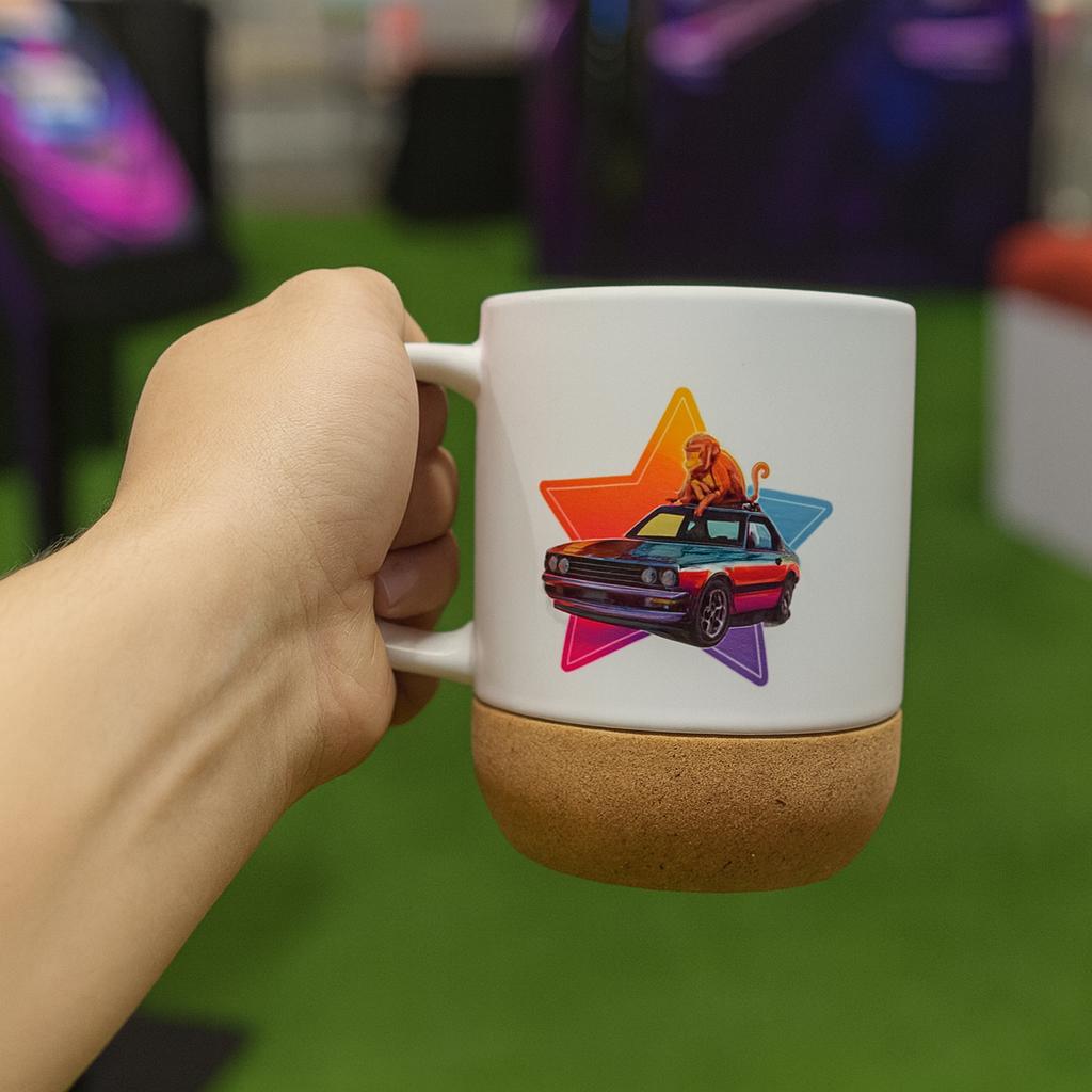 Two people customizing merchandise on tablets using Craft AI at an exhibition stand, with branded mugs and T-shirts displayed in a vibrant, professional setup